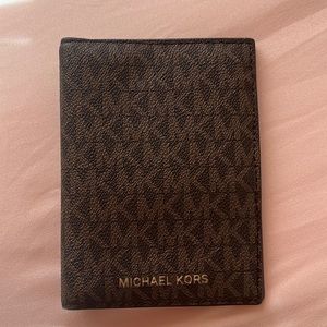 Brand new Michael Kors passport holder/ travel wallet